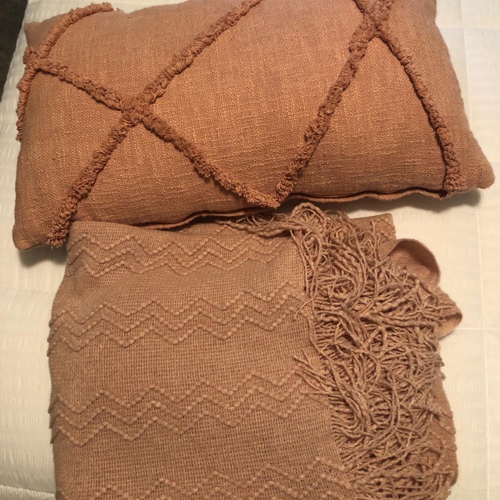 Blush pink throw pillow and blanket